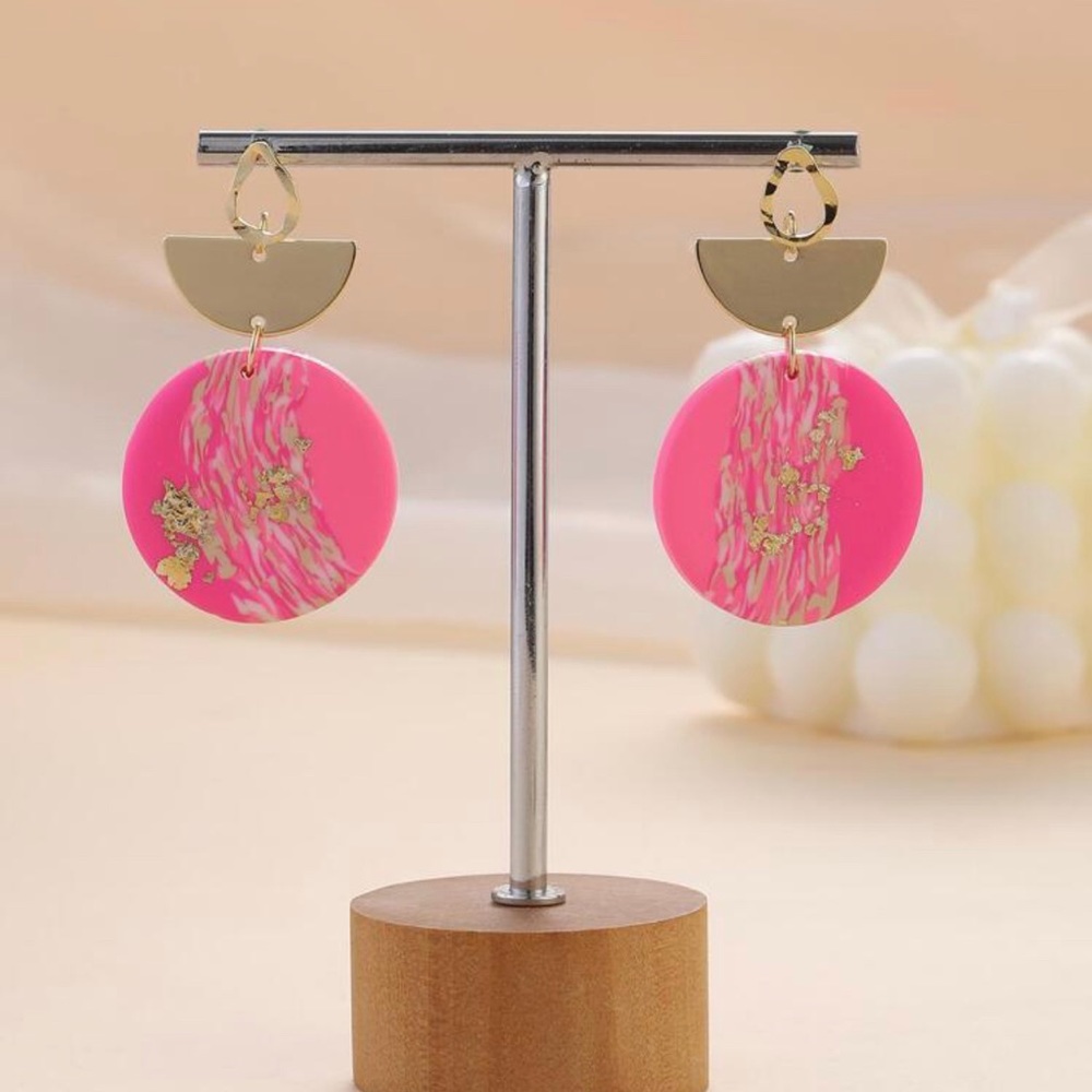 Hot pink and gold drop earrings.
